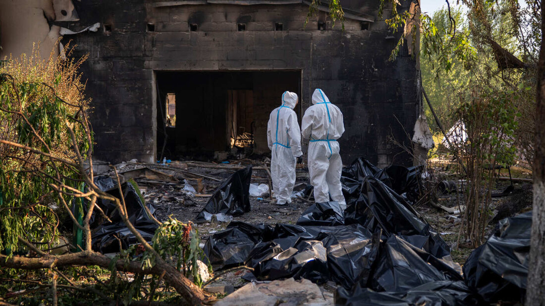 dpatopbilder - Rettungskräfte im Dorf Myla. Foto: Dan Bashakov/AP/dpa 20260830141837277.jpg