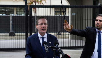 Keystone/AP/Rick Rycroft 20260218183318883.jpg